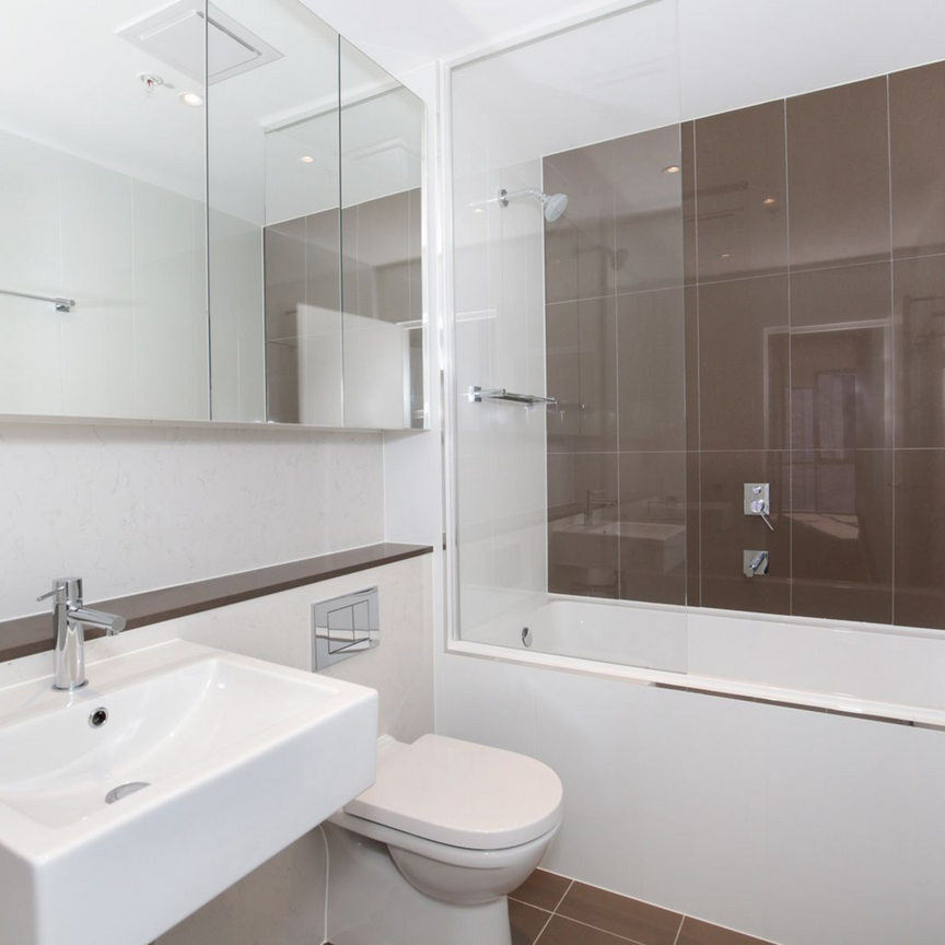 LUXURY LIVING AT BURWOOD SQUARE - SEMI-FURNISHED 2-BEDROOM APARTMENT WITH BREATHTAKING VIEWS - Photo 1