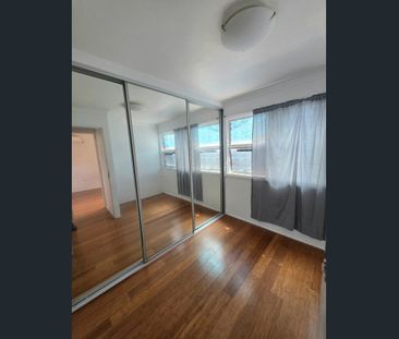 Neat and Tidy 2 Bedroom with Sun Room - Photo 3