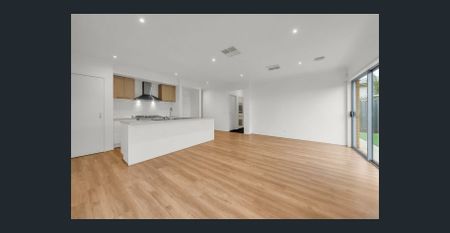 Modern Light-Filled Family Home in the Heart of Mt Atkinson Estate! - Photo 2