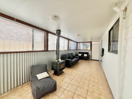 Experience Indoor Comfort and Outdoor Bliss! - Photo 2