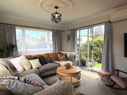 Character 1950s Cottage with Modern Comforts - Photo 1