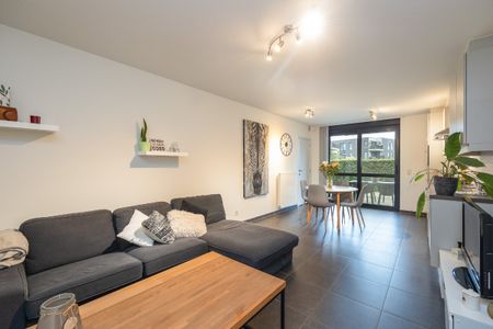 Gelijkvloers appartement (66m²) met tuintje en parking - Photo 5