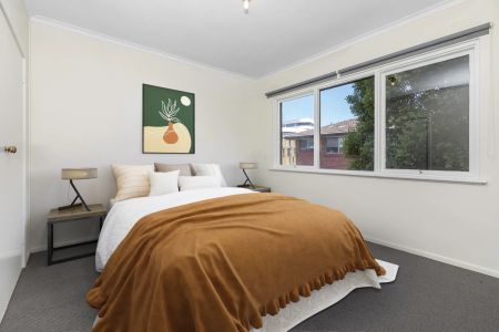 Stylish Two-Bedroom Gem with Secure Parking in a Winning Location! - Photo 5