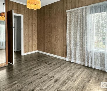 THREE-BEDROOM HOME WITH GARAGE - Photo 1