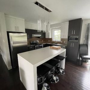 Haut de maison 4 1/2 avec cours arriere - Photo 2