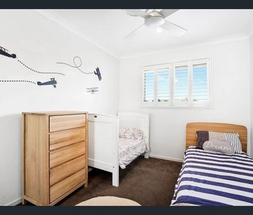 Stylish 3-Bedroom Townhome with Entertainer’s Deck & Modern Kitchen - Photo 3