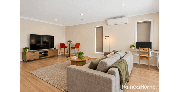 Modern 4-Bedroom Family Home with Comfort and Convenience! - Photo 1