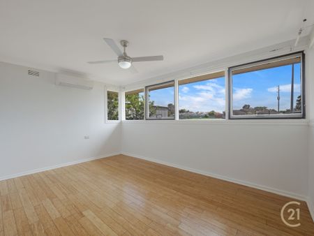 Comfortable Family Living with Spacious Backyard - Photo 4