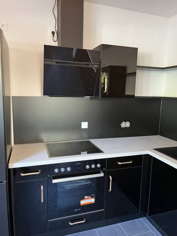 Neuwertige Maisonette Wohnung + Garten in DA City - Photo 2