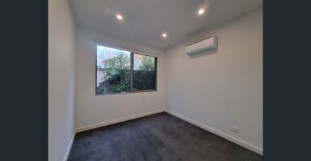 Modern Townhouse In McKinnon School Zone - Photo 2