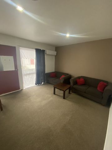 This conveniently located two-bedroom unit puts you just minutes from key Hamilton destinations. - Photo 3