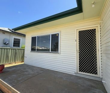 TIDY THREE BEDROOM HOME - Photo 1