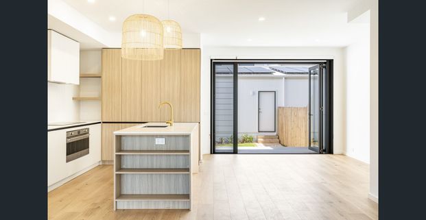 Immaculately Designed 2-storey Townhouse - Photo 1