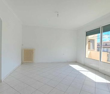 Location - Appartement T4 de 70 m² avec deux balcons et cave - Photo 1