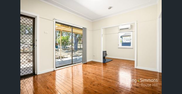 Charming Family Home with Spacious Backyard! - Photo 1