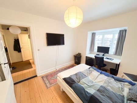 Hyggelig 2 værelses lejlighed med udsigt til østre anlæg - Photo 5