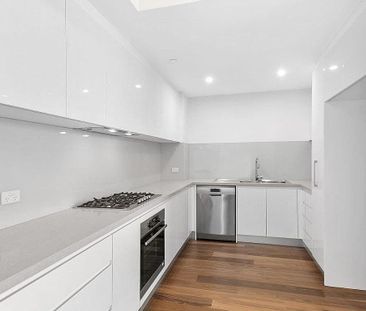 Stylish Two-Bedroom in Prestigious Signature Building - Photo 4