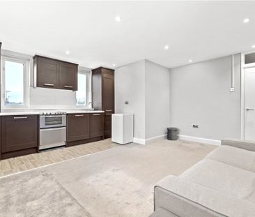 Located within secure gated grounds on a peaceful residential stree... - Photo 3