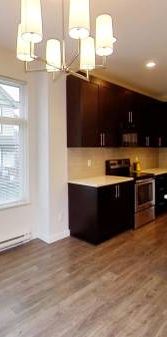 Bright and Spacious 4 Bedroom Corner Unit Townhouse in an Exceptional - Photo 1