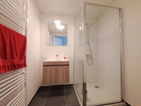 CENTRAAL GELEGEN GELIJKVLOERS APPARTEMENT MET TUINTJE - Photo 1