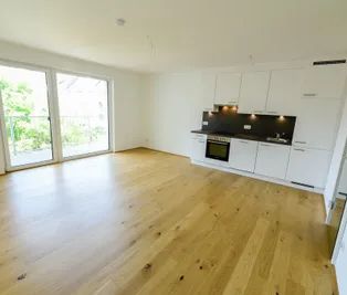 HELL, NEUWERTIG UND BARRIEREFREI MIT GROSSEM BALKON - Photo 1