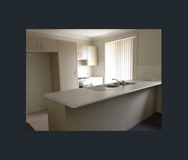 Modern and Low-Maintenance Living in a Convenient Location - Photo 1