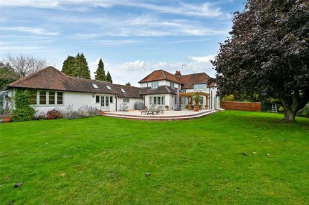 A beautifully presented detached home with private driveway, double garage and fully furnished interiors including five bedrooms in village setting - Photo 3