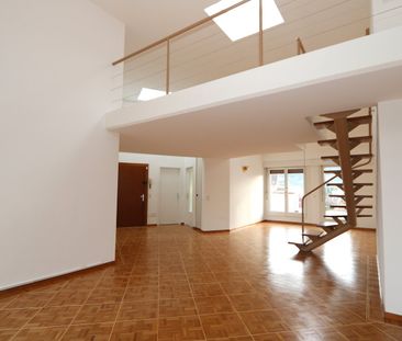 Appartement de 5 pièces en attique avec mezzanine et terrasse à Thônex - Photo 1