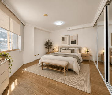 Stylish One-Bedroom Apartment with Sunroom, Large Lock-Up Garage - Photo 3