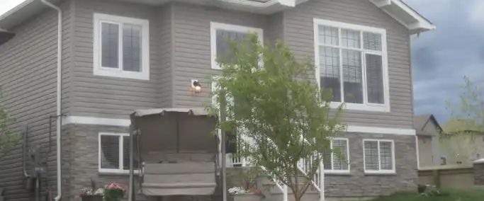 Gorgeous 1,080 sq ft Furnished 3 Bedroom Legal Suite overlooking pond. | 129 Snowy Owl Way, Fort McMurray - Photo 1