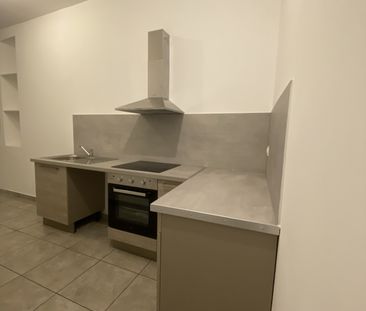 Location Appartement 2 pièces 45m² NIMES 30000 - Photo 1
