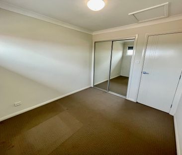 Five Bedrooms/Three Bathrooms! - Photo 1