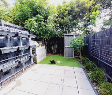 Stylish 2-Bedroom Home with Modern Comforts & Private Outdoor Spaces - Photo 3