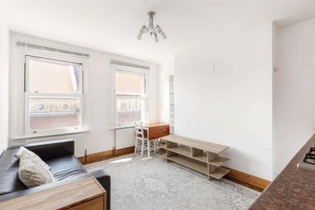 A charming two-bedroom apartment situated in the heart of Brook Green, offering over 500 sq ft of well-presented living space available immediately. - Photo 3
