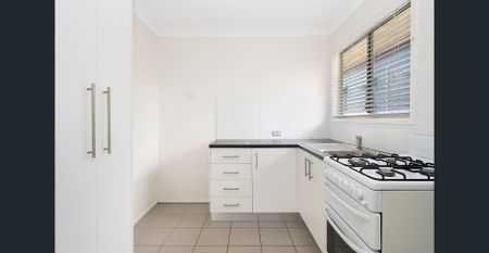 Well appointed and close to shops & transport - Photo 2