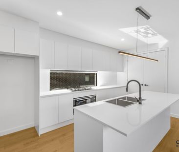 Spacious 4-Bedroom Townhouse - Photo 6