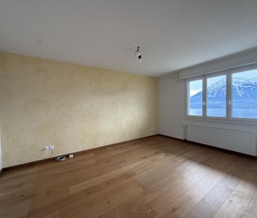 Traumaussicht auf den Thunersee:Grosszügige 2.5-Zimmerwohnung im EG - Foto 1
