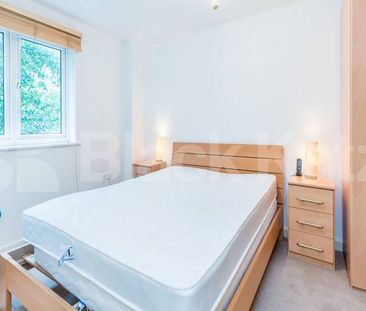 1 bedroom apartment located within a gated development with a balcony - Photo 5