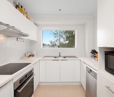 RENOVATED INNER-CITY RETREAT WITH BALCONY & LOCK-UP GARAGE - Photo 6