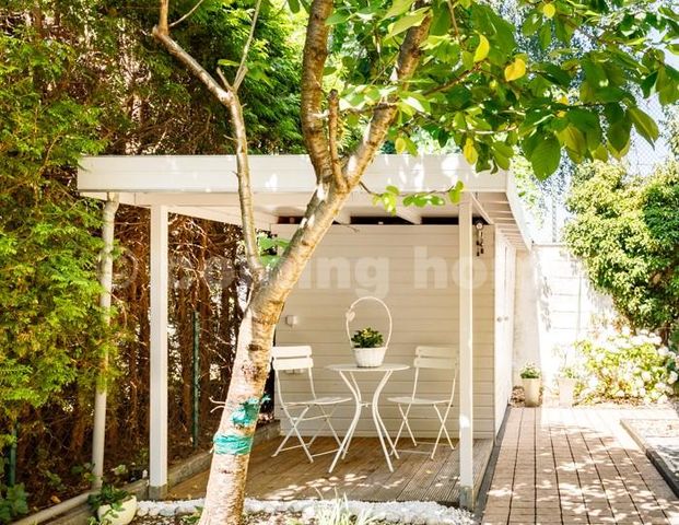 Garden Living - Photo 1