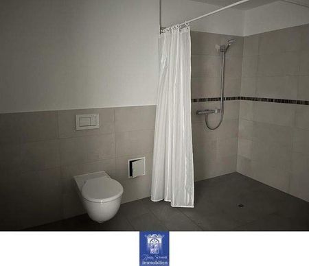 Wohlfühlwohnung mit Terrasse und moderner Ausstattung im Erstbezug! Rollstuhlgerecht! - Photo 3