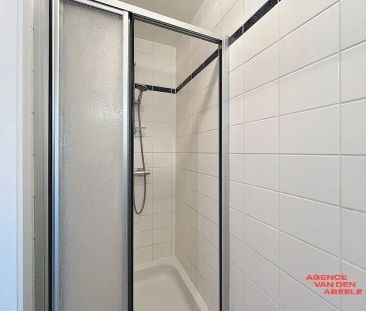 Lichtrijk appartement met zeer ruim terras gelegen te centrum Oostkamp - Photo 6