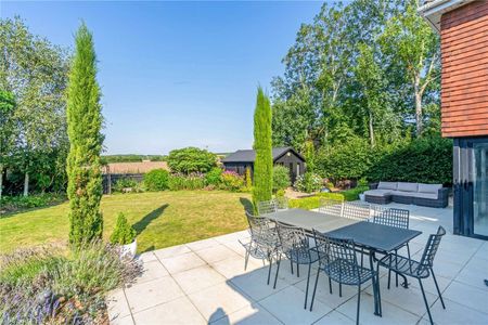 A charming, modern four-bedroom family home in the popular village of Little Marlow, with fabulous countryside views. - Photo 3