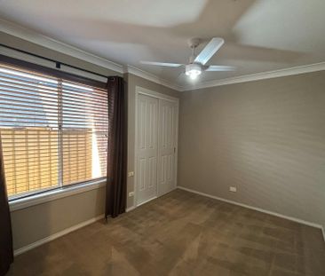 COMFORTABLE FOUR BEDROOM FAMILY HOME - Photo 1