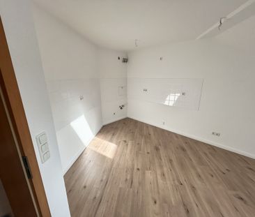 Dachgeschosswohnung mit zwei Zimmern und wunderschönem Ausblick! - Photo 4