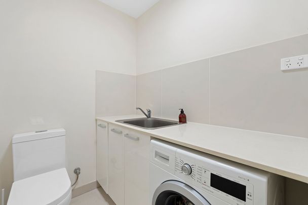 Stylish Modern Townhouse with Walkable Convenience and Resort-Style Comfort - Photo 1