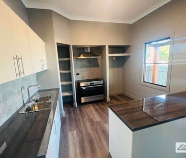 Newly Renovated 4 Bedroom Home - Photo 6