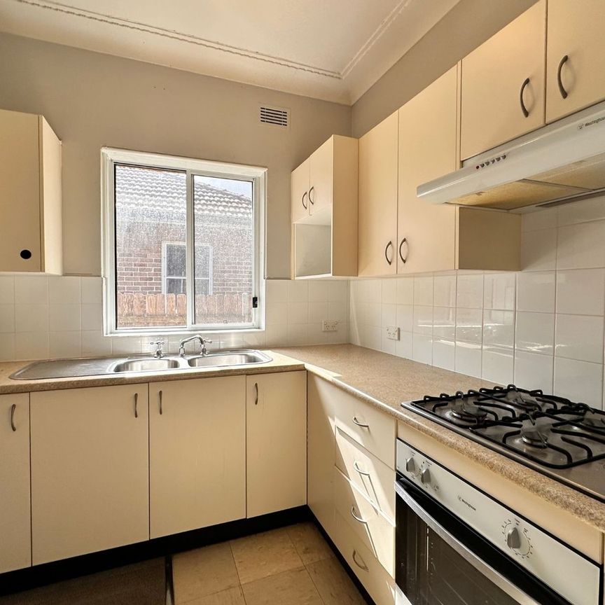 Family Comfort and Convenience in Prime Villawood Location! - Photo 1