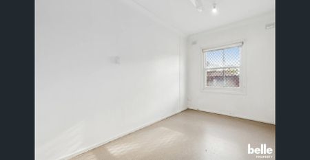 Comfortable 3-Bedroom Home with Spacious Yard in a Convenient Location - Photo 2