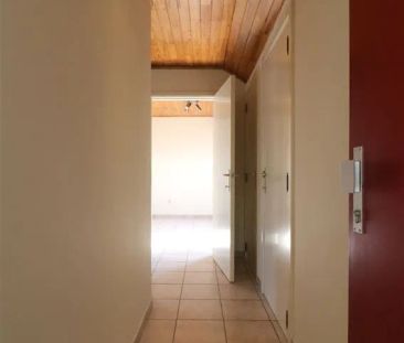 Gezellig dakappartement, grote leefruimte, 1 slpk. en garage te Zichem - Photo 3